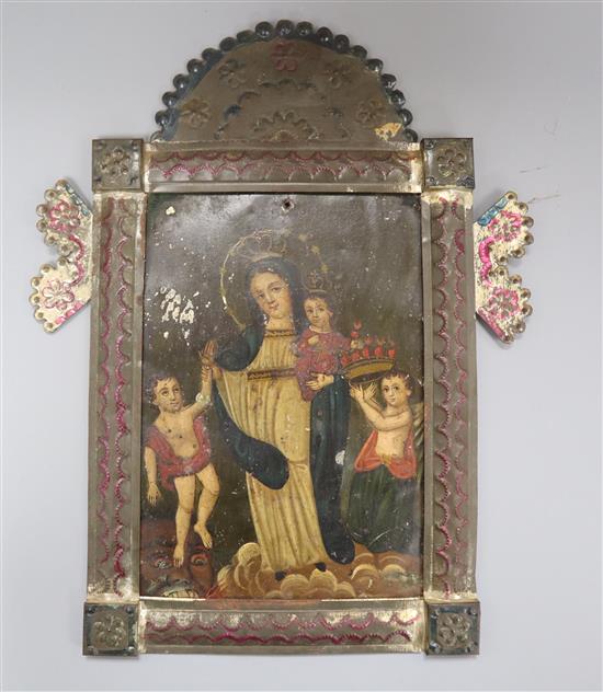 A Mexican Retablo icon on zinc, framed overall length 38.5cm